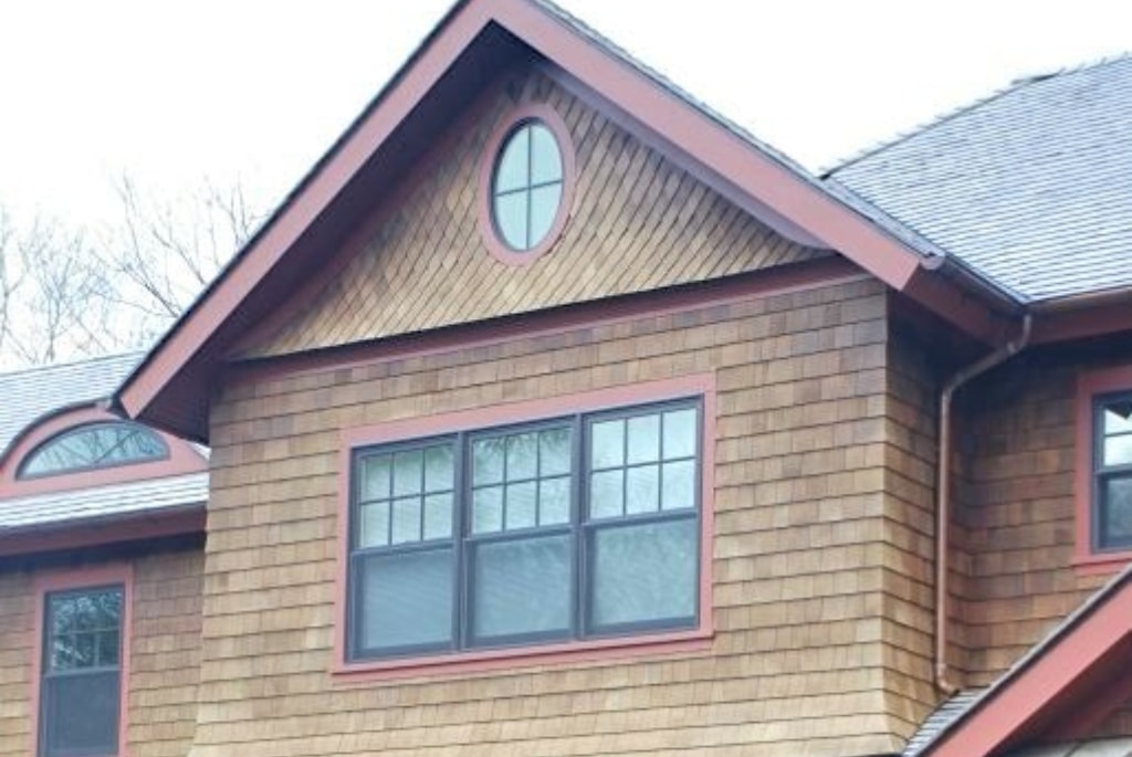 Shingle style home with aluminum clad windows finished in bronze color