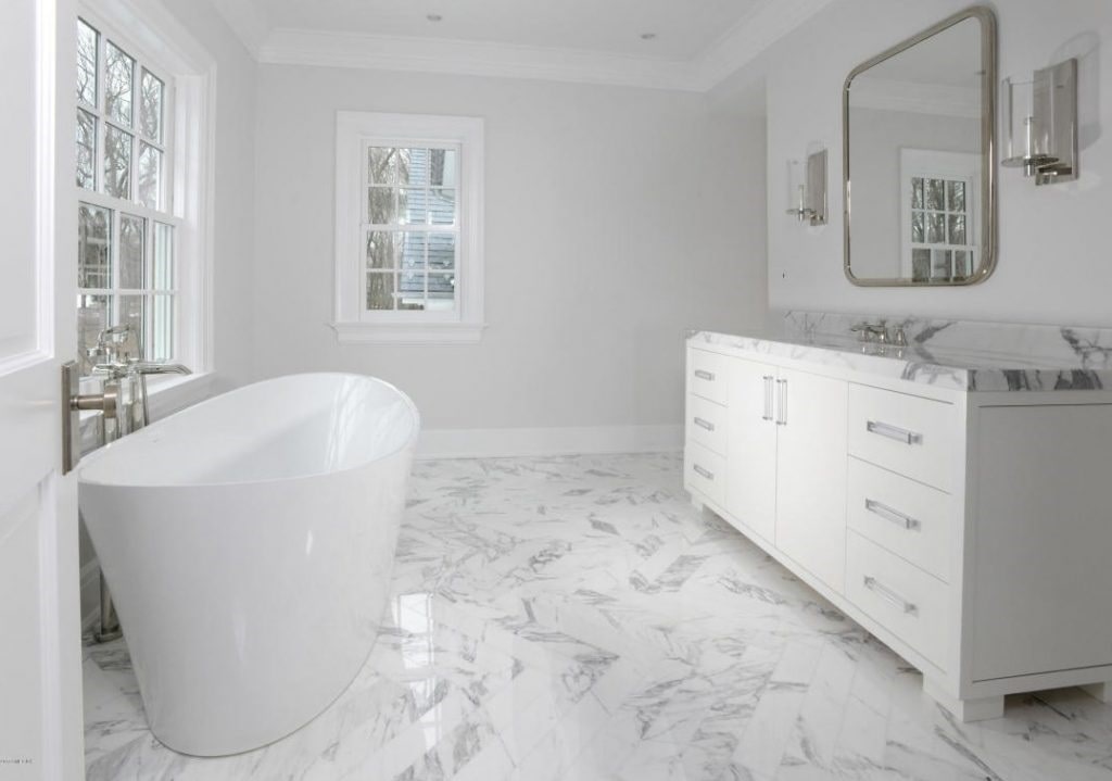 Bathroom with tub in Greenwich CT spec house