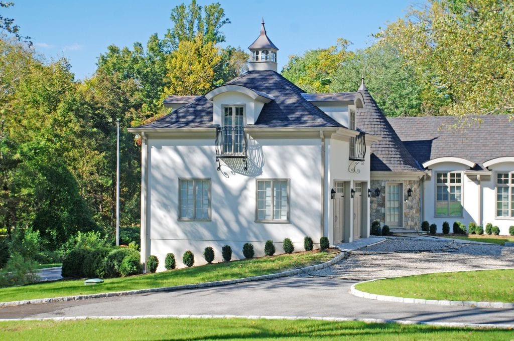 Greenwich CT home design with turret mud room entry by DeMotte Architects