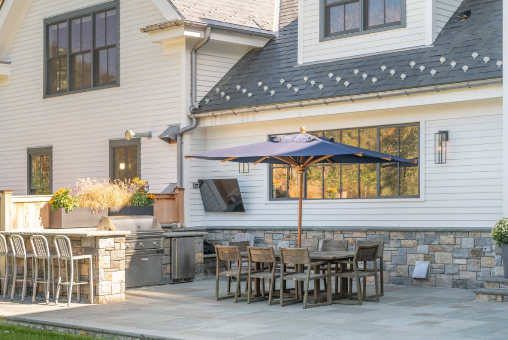 Outdoor kitchen and bar in Greenwich CT modern farmhouse