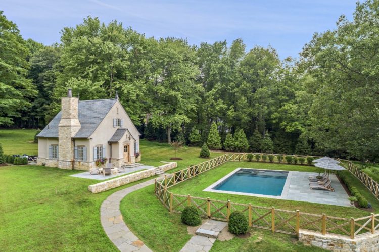 French country pool house in Westchester County NY by DeMotte Architects